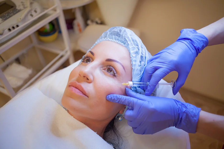A Woman Getting Cheek Filler Treatment