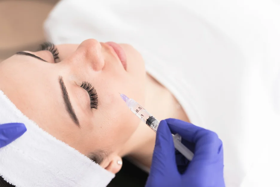 A Woman Getting Cheek Filler Treatment