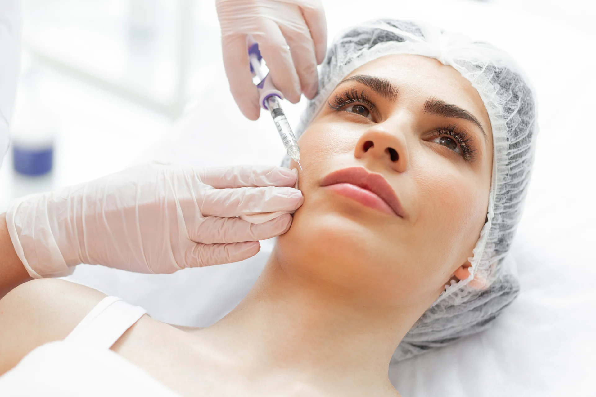 A woman having cheek fillers||