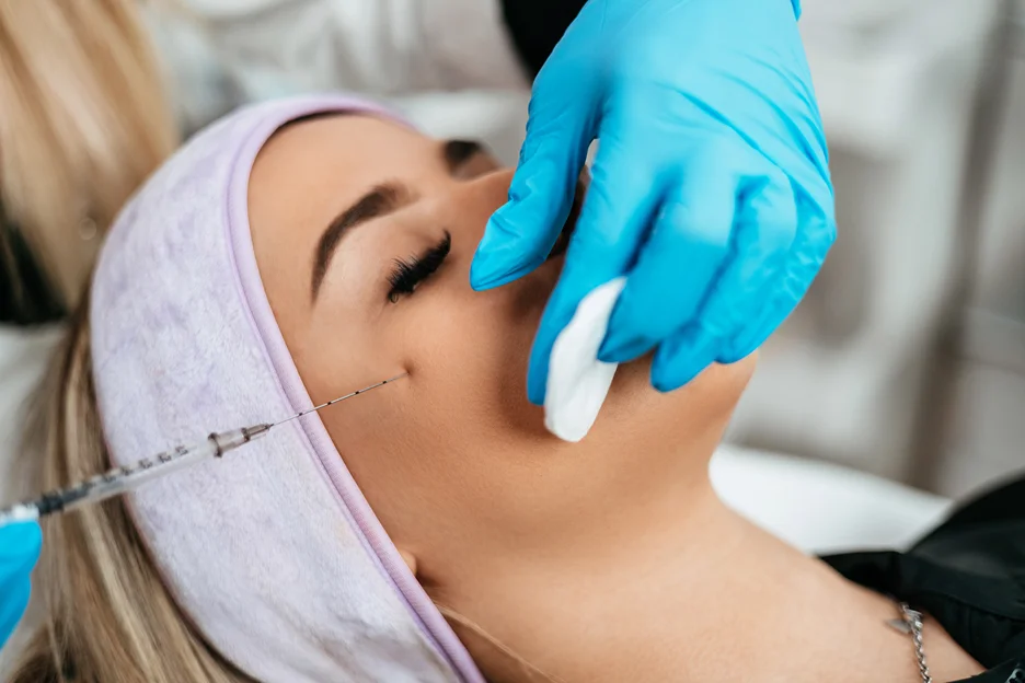 A Woman Getting Cheek Filler Treatment