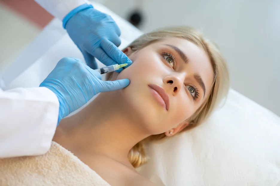 A Woman Getting Cheek Filler Treatment