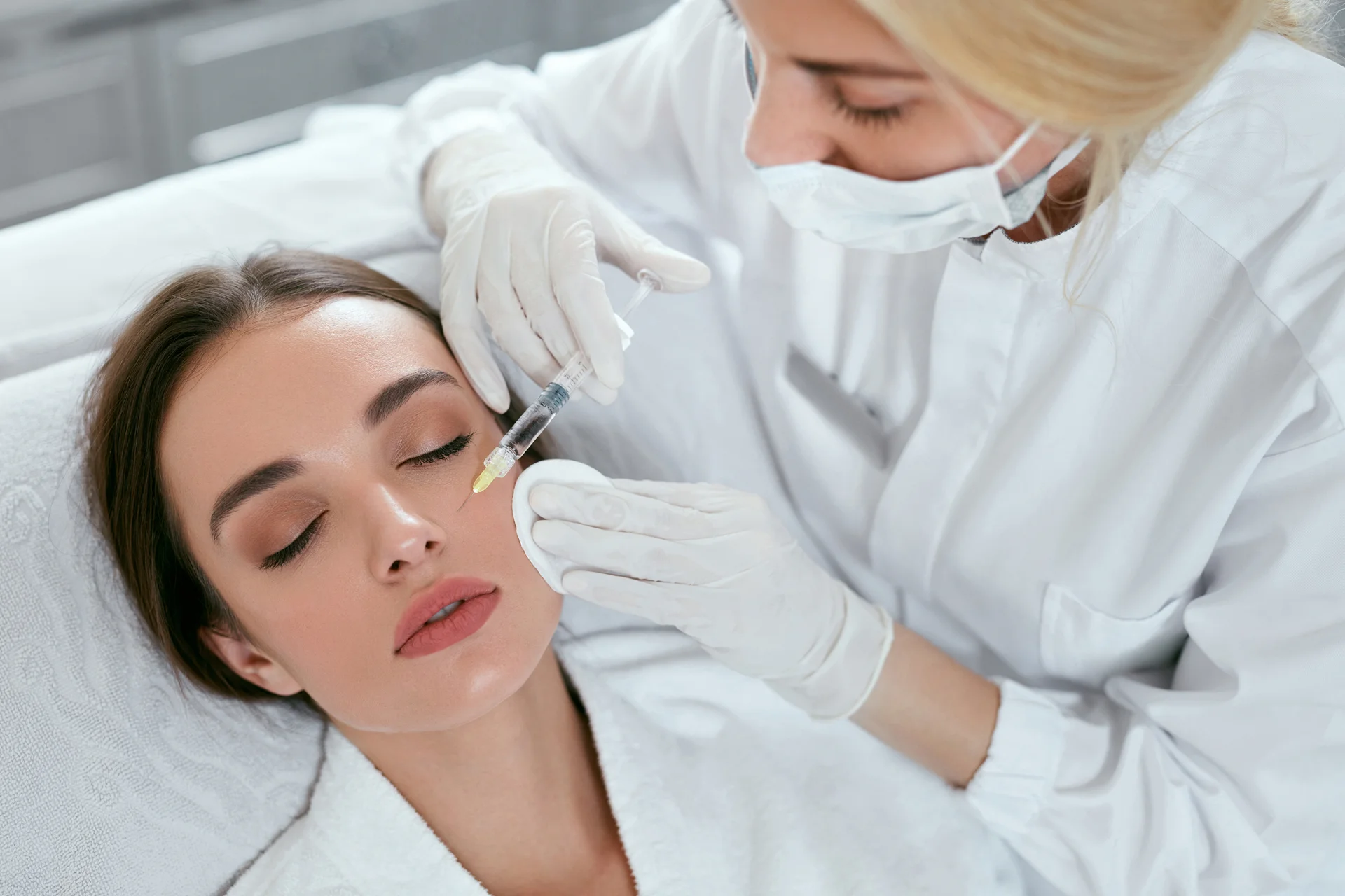 a woman having cheek fillers||