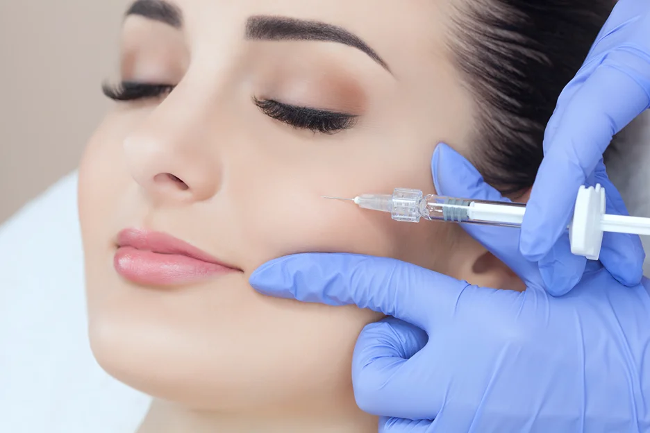 A Woman Getting Cheek Filler Treatment