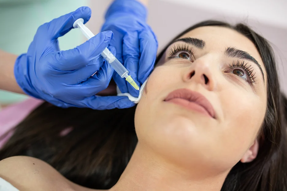 A Woman Getting Cheek Filler Treatment