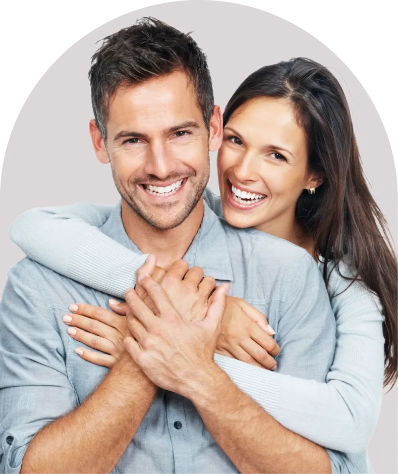 Smiling couple representing wellness and intimate optimization services